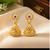 Ruby Stone Gold-Plated Jhumka Earrings