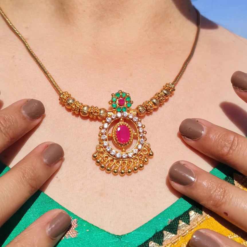 Traditional Gold-Plated Necklace with White and Emerald Stones – Elegant Festive Design