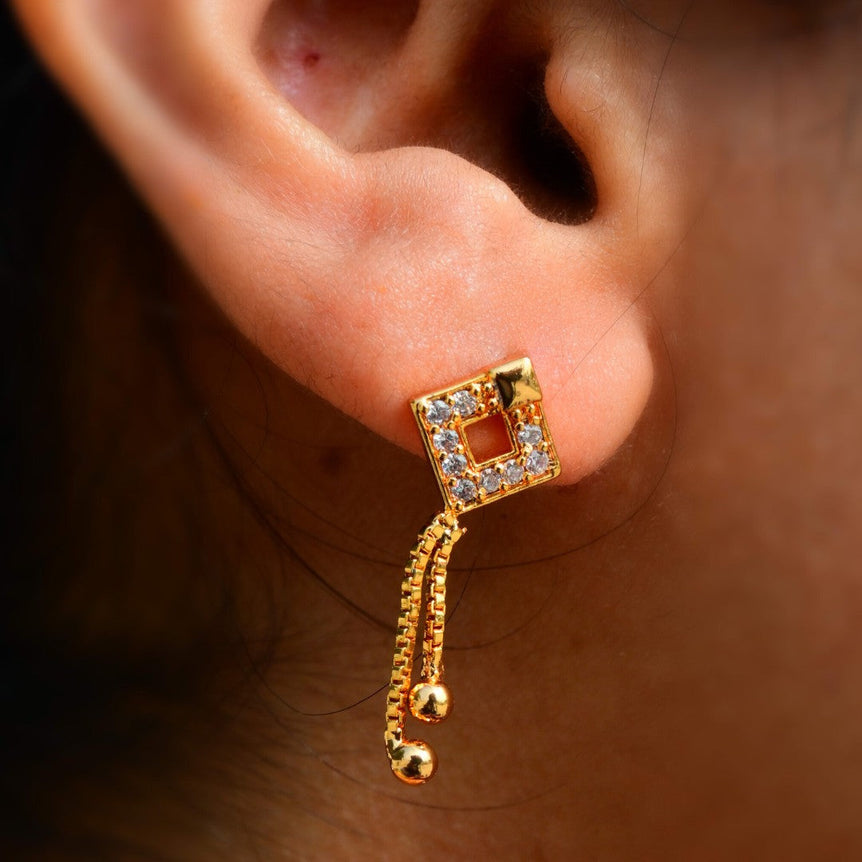 Square stud with White Ruby stones